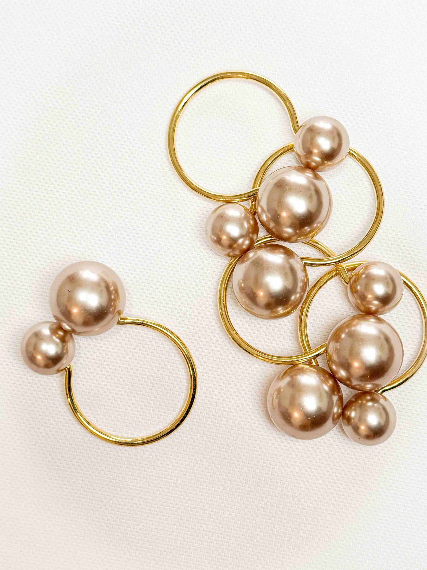 חבק מפיות פנינים בגוון שמפניה