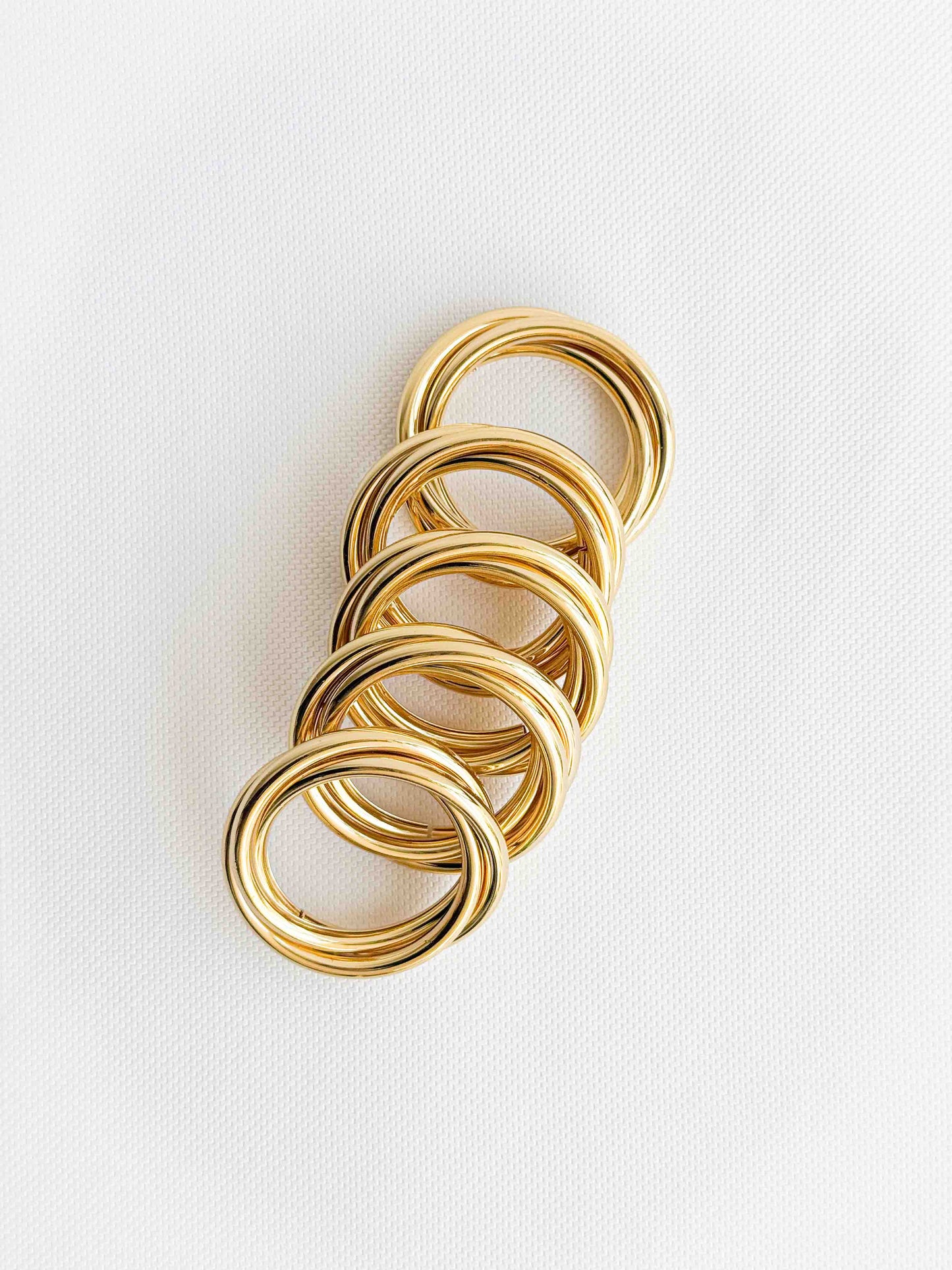 חבק טבעות זהב משולבות